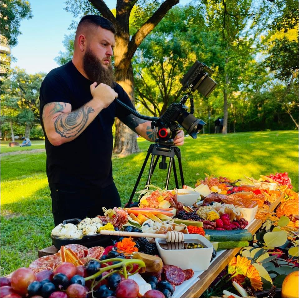 Cinematic product shoot of a charcuterie spread outdoors
